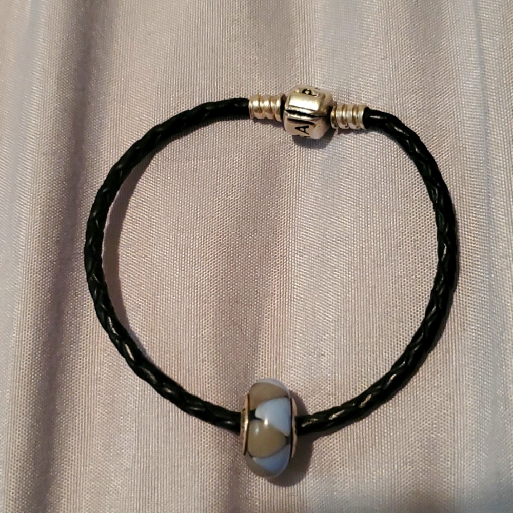 Pandora bracelet with murano glass charm.